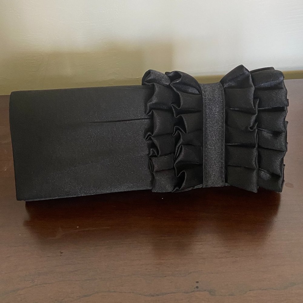 Black silk clutch with ruffles